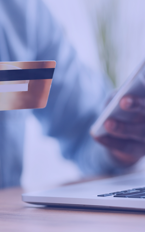 black-man-using-card-and-smartphone-for-paying-bil-SPG8SE6